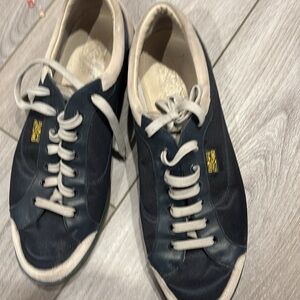 Salvatore Ferragamo Black and Cream Sneakers with Classic Lace-Up Design